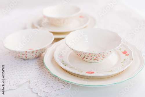 Closeup of porcelain plates and bowls
