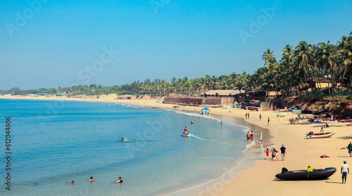 Sunny Beach with Tourists in the Goa state, India