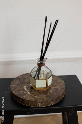 Stone stand for aroma bottles in a bright room