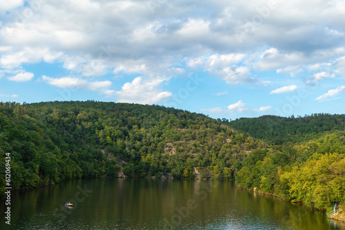 Panorama of a natural body of water in a forest landscape. Brno Reservoir - Czech Republic.