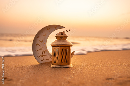 Traditional Candle light with Crescent moon shape on the beach, Ramadan Kareem background 2024