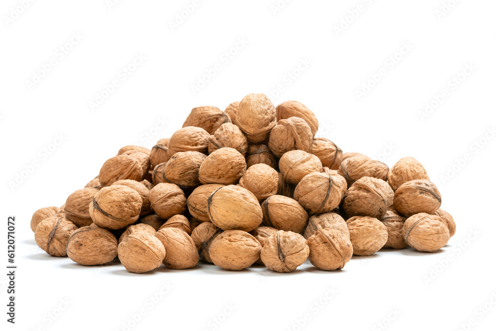 Heap of unpeeled nuts over white background Heap of unpeeled nuts over white background