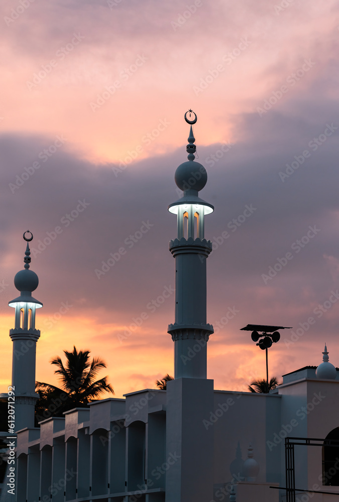 Colourful sunset sky with mosque view, Ramadan and Eid Mubarak background