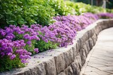 Concrete Retaining Wall with Stone Collar Building on Purple Flowers in Flowerbed - Architectural Detail in Garden Park Along Footpath: Generative AI