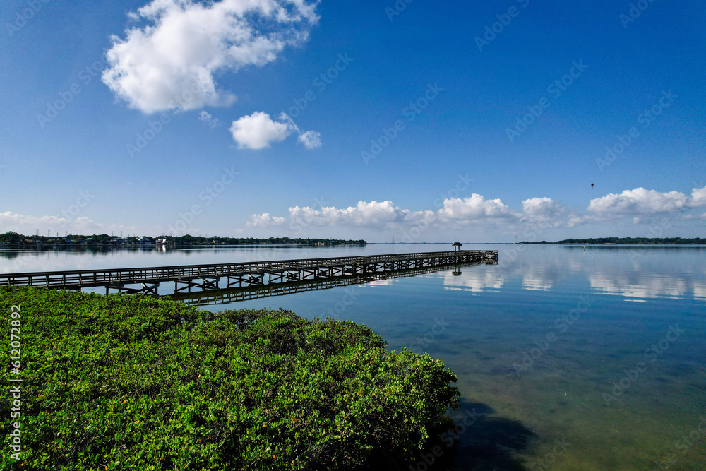 A drone photo of RE Olds city park in Tampa Bay, Florida. An aerial view of the fishing pier.