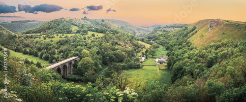 фотография Panoramic landscape from Monsal Head looking down to the Monsal trail viaduct in Derbyshire Peak District