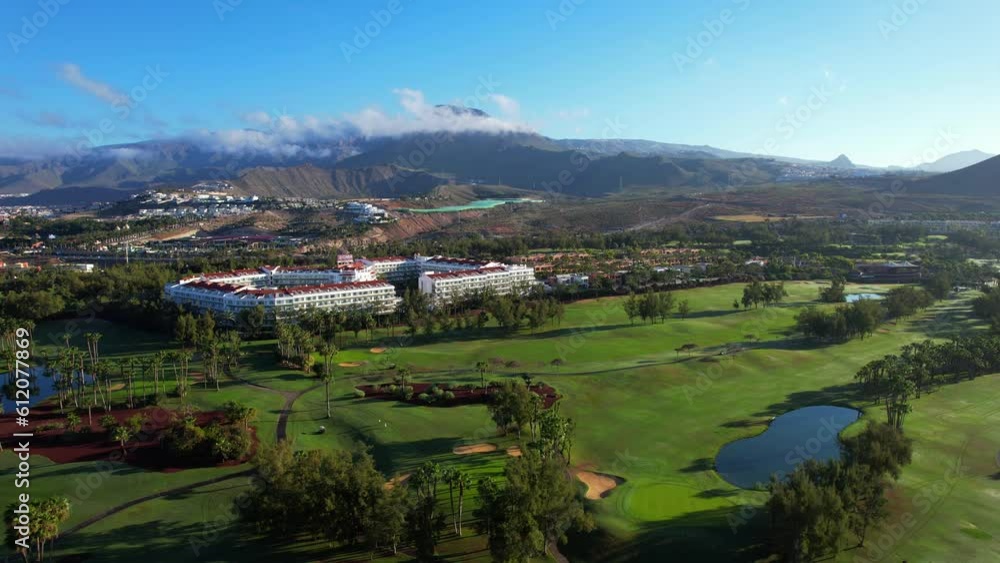 Aerial view above golf course surrounded by villas, condos and resort in Playa las Americas, Tenerife, Canary Islands Spain Aerial view above golf course surrounded by villas, condos and resort in Playa las Americas, Tenerife, Canary Islands Spain