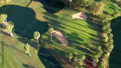 Aerial view above golf course surrounded by villas, condos and resort in Playa las Americas, Tenerife, Canary Islands Spain photo