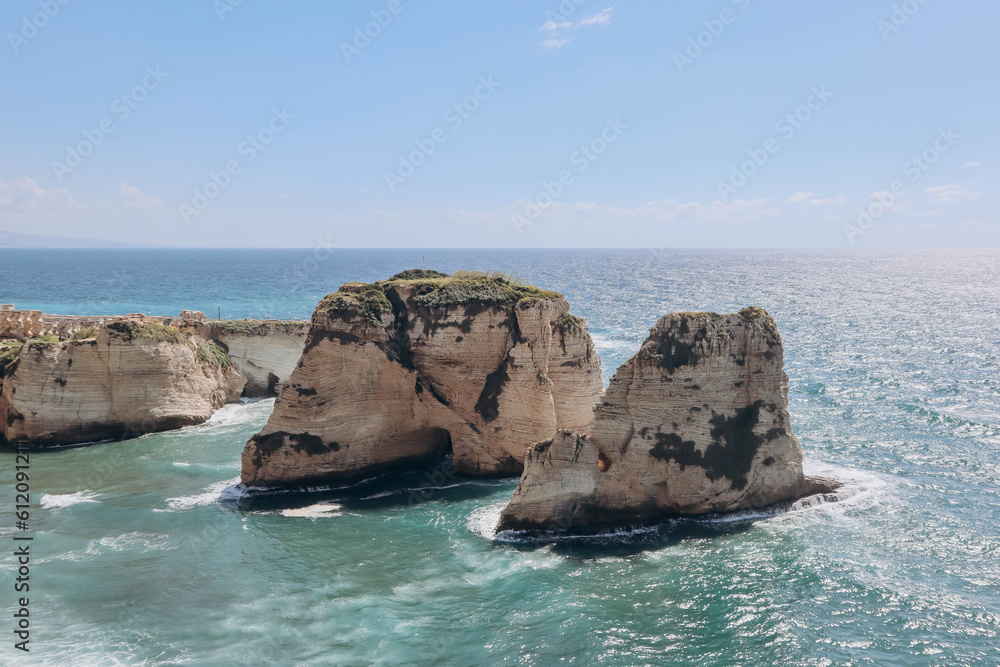 Fototapeta premium Pigeon Rock (Raouché), famous landmark of Beirut, natural landmark consisting of two rock formations off the coast of Raouché.