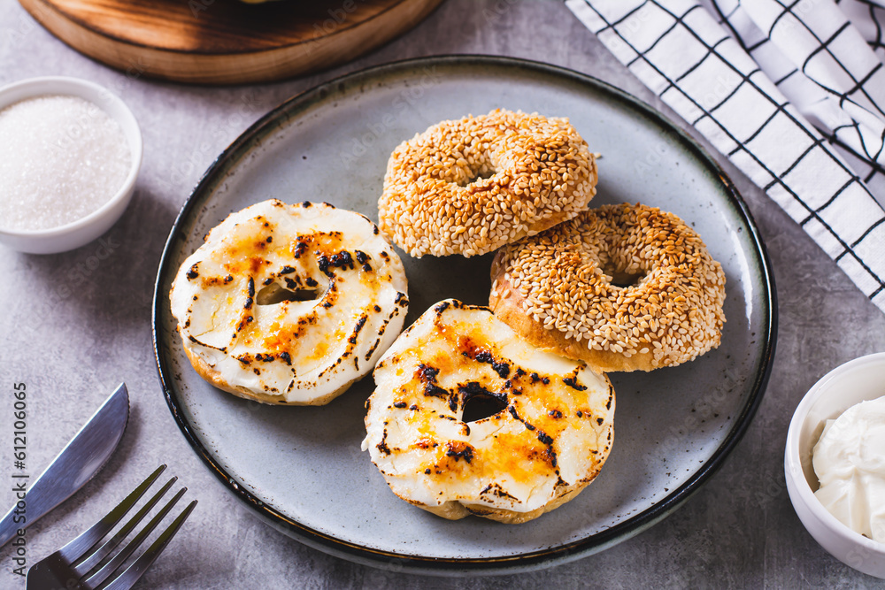Sweet creme brulee bagels with cream cheese and caramelized sugar for breakfast Sweet creme brulee bagels with cream cheese and caramelized sugar for breakfast