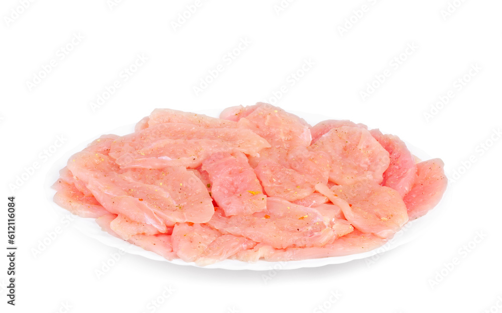 chicken meat slices prepared for cooking on a white plate on a white background chicken meat slices prepared for cooking on a white plate on a white background