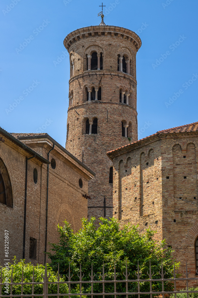 Vertical Outside Exposure of the Battistero Neoniano, ancient Roman religious building and Cathedral of teh Resurrection of Jesus Christ, from Piazza Arcivescovado in Ravenna, Italy, on a sunshiny day