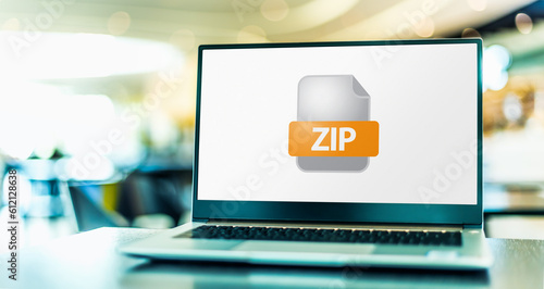 Billede på lærred Laptop computer displaying the icon of ZIP file