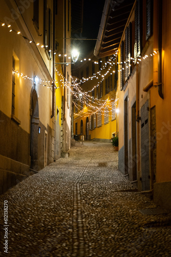 narrow street at night, italy