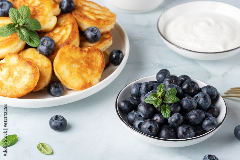 Homemade mini pancakes with blueberries Homemade mini pancakes with blueberries