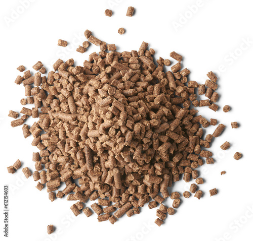 Fotografía pile of chicken feed pellets, common form of feed used in poultry industry, comp