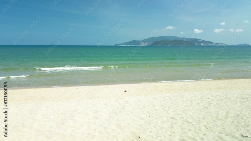 Sunny tropical beach. Ocean Waves. Nha Trang beaches. Caribbean beach background. Hot afternoon on an empty beach. The best beaches in the world. Concept, vacation, travel, sand, sea. 4K Sunny tropical beach. Ocean Waves. Nha Trang beaches. Caribbean beach background. Hot afternoon on an empty beach. The best beaches in the world. Concept, vacation, travel, sand, sea. 4K