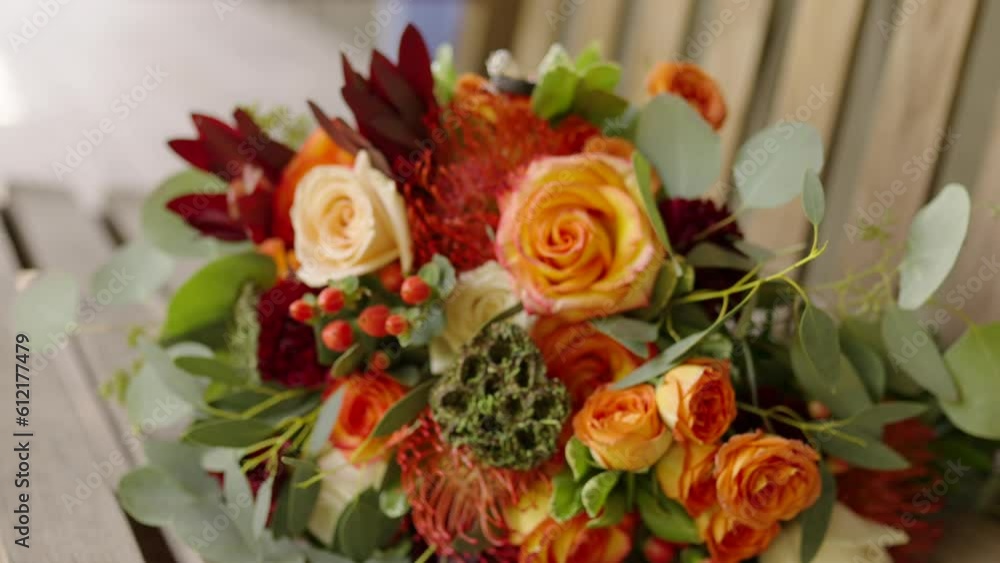 bouquet sitting on rocking bench on wooden porch bouquet sitting on rocking bench on wooden porch