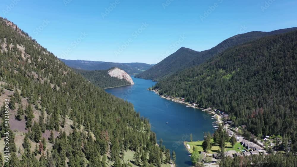 Bask in Nature's Splendor: Exploring Paul Lake in Kamloops on a Sun-Drenched Day, Encircled by Forested Peaks Bask in Nature's Splendor: Exploring Paul Lake in Kamloops on a Sun-Drenched Day, Encircled by Forested Peaks