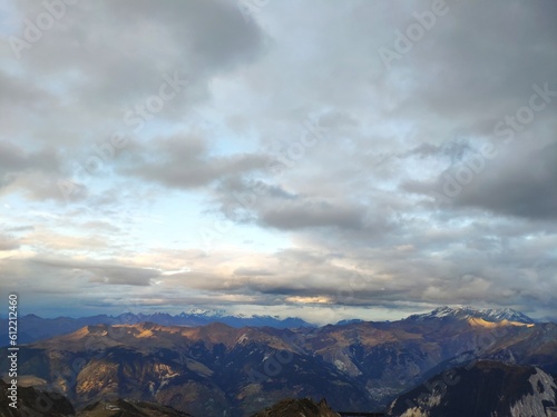 Mountains range with clouds and blue sky