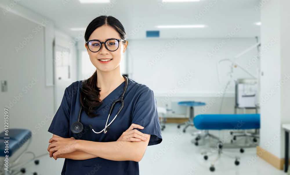 Obraz premium Portrait of happy doctor or nurse at hospital corridor