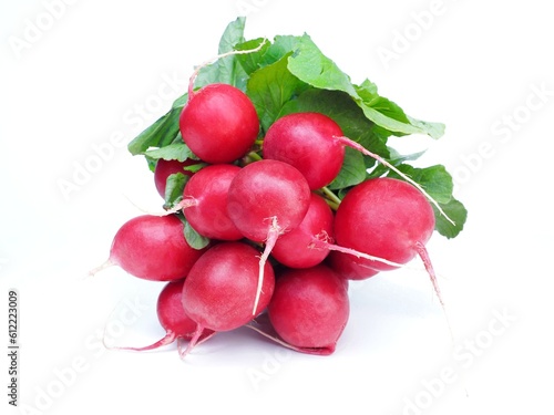 A bunch of fresh red radishes isolated on white
