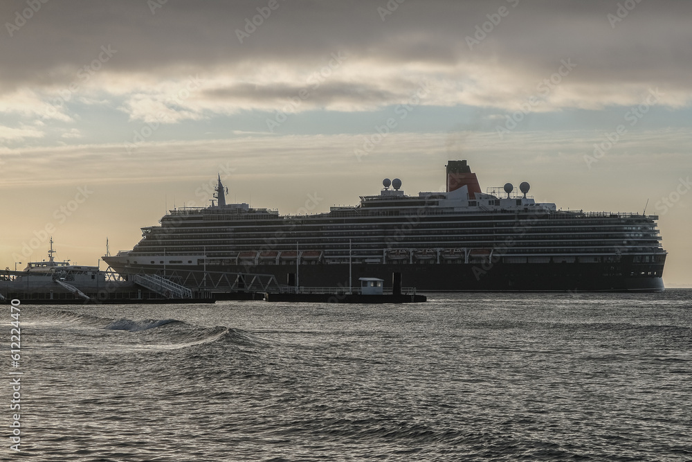 Luxury ocean liner cruiseship cruise ship Victoria or Elizabeth in port of Lisbon, Portugal during Mediterranean cruising with city skyline, Christos statue and suspension bridge Luxury ocean liner cruiseship cruise ship Victoria or Elizabeth in port of Lisbon, Portugal during Mediterranean cruising with city skyline, Christos statue and suspension bridge