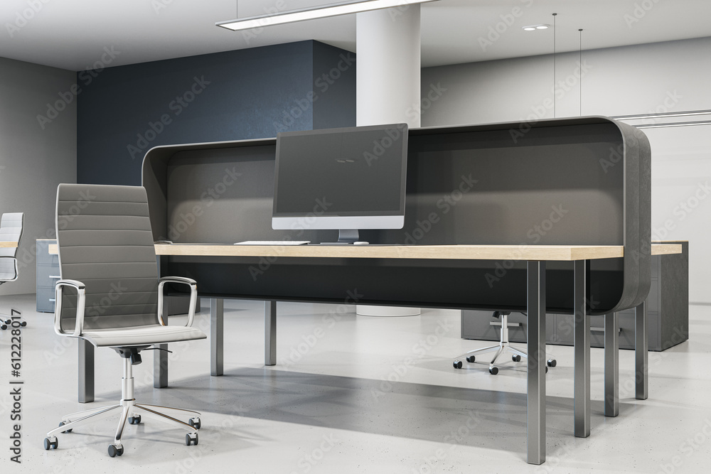 Modern coworking office interior with furniture, empty computer monitors and concrete flooring. Mock up, 3D Rendering. Modern coworking office interior with furniture, empty computer monitors and concrete flooring. Mock up, 3D Rendering.