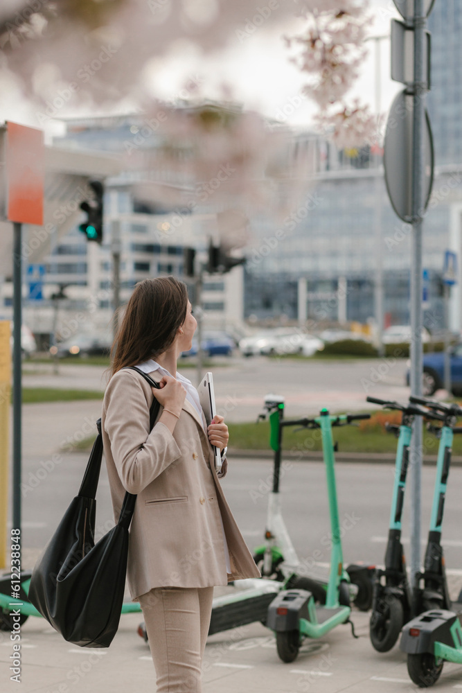 Young businesswoman standing at footpath Young businesswoman standing at footpath
