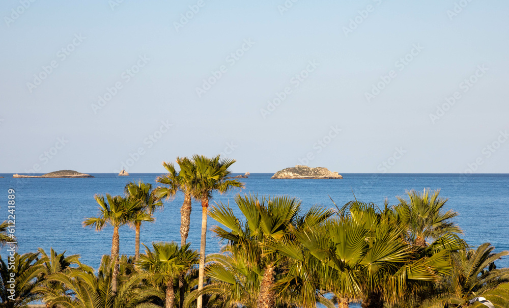 Playa d'en Bossa, Ibiza. View of the the sea and the islands along the coast.