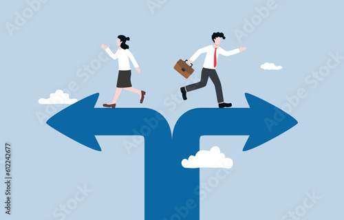 Breakup of business partner, project team dissolution, conflict of interest, disagreement of opinion concept, Businessman and businesswoman walking in opposite directions of split arrow. photo
