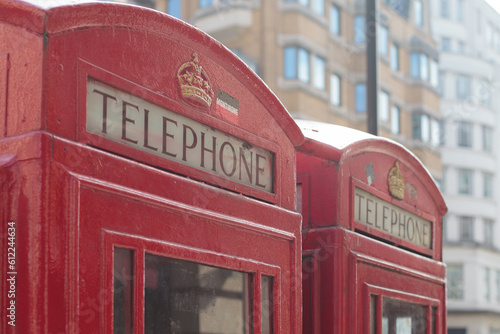 Close-Up view of Telephone sign on Red Telephone Box in London UK