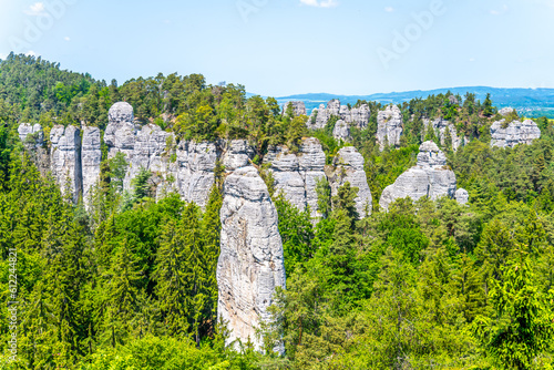 Panoramic view of a sandstone rock city in Bohemian Paradise, Czech: Cesky raj. View of Band, Czech: Kapela, rock formation on sunny summer day. Czech Republic