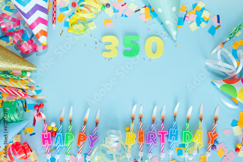 Top view card happy birthday with number  350. Copy space. Postcard holiday anniversary. Happy birthday multicolored background for mensto text, with a numeral with pretty decorations in pastel colors photo