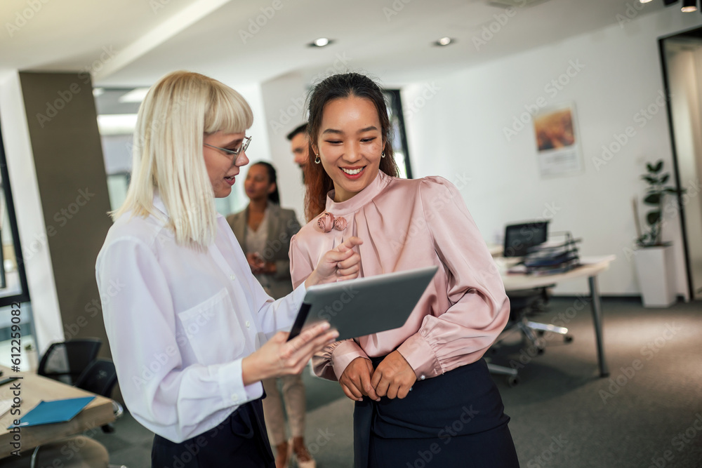 Group of multiethnic business people working together in the office Group of multiethnic business people working together in the office