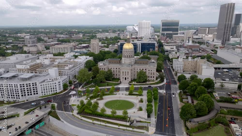 Georgia state capitol building in Atlanta, Georgia with drone video moving up in a circle. Georgia state capitol building in Atlanta, Georgia with drone video moving up in a circle.