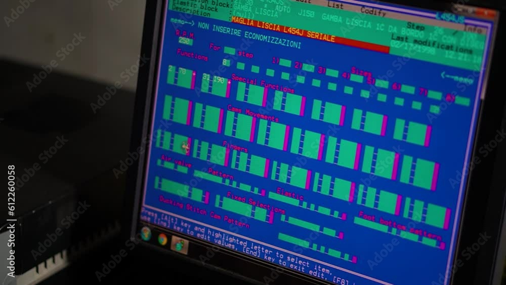 The computer screen controls the production unit and the design of the garment in a socks production factory The computer screen controls the production unit and the design of the garment in a socks production factory