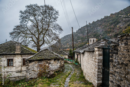 Kapesovo village, a small but graphical village in zagorochoria on a beautiful winter rainy day, Ioannina, Epirus, Greece photo