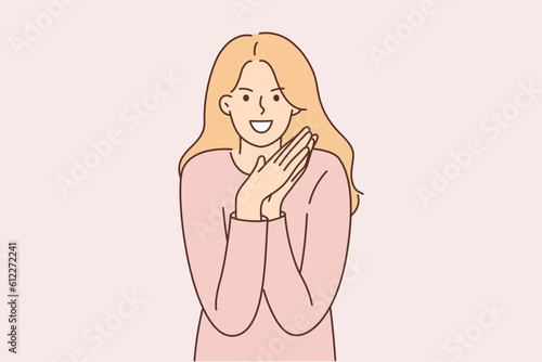 Cunning woman smiles and rubs palms, wanting to commit mean act or deceive for financial gain