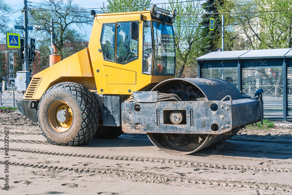 Road roller for road construction. Asphalt concrete roller for compaction of soil and foundations in road construction. Modern construction equipment. Heavy construction equipment. Road roller for road construction. Asphalt concrete roller for compaction of soil and foundations in road construction. Modern construction equipment. Heavy construction equipment.