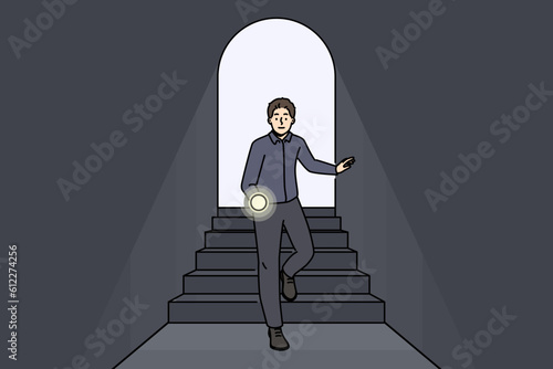 Scared man with flashlight walking in dark tunnel. Frustrated male with light in hands enter black room. Darkness and fear. Vector illustration. 