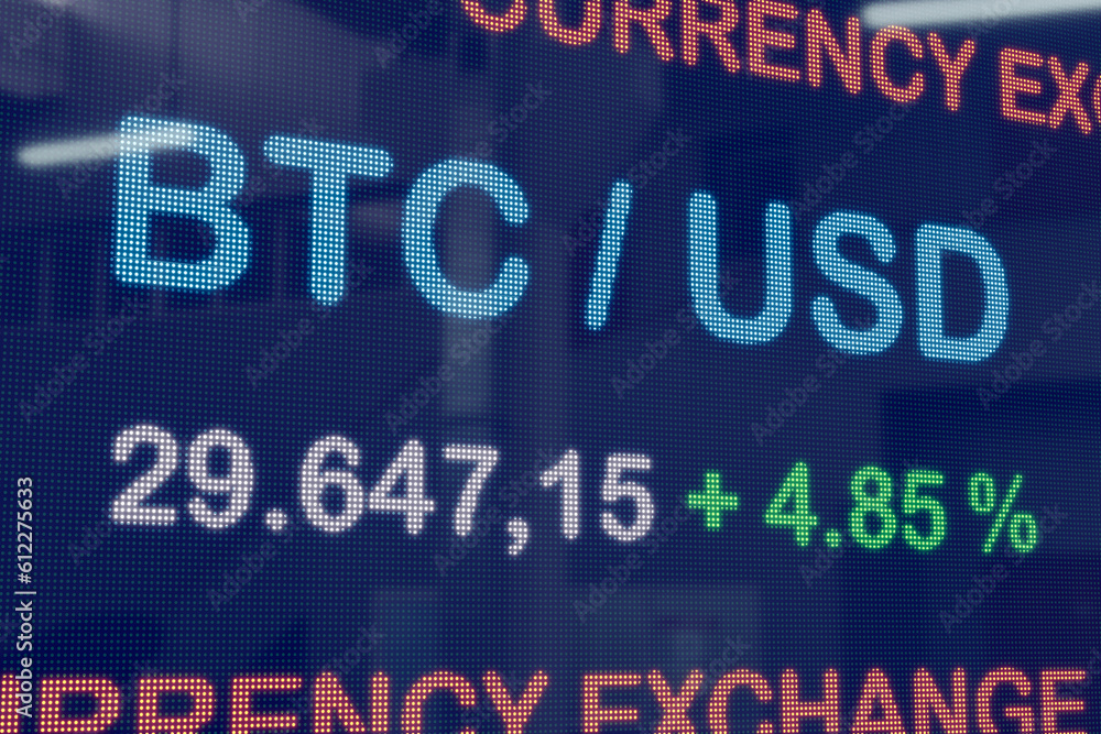 BTC - USD exchange rate. Crypto exchange trading LED screen. Bitcoin to the US Dollar rate moving up. Block chain technology, business, cryptocurrency trading and digital money. 3D illustration