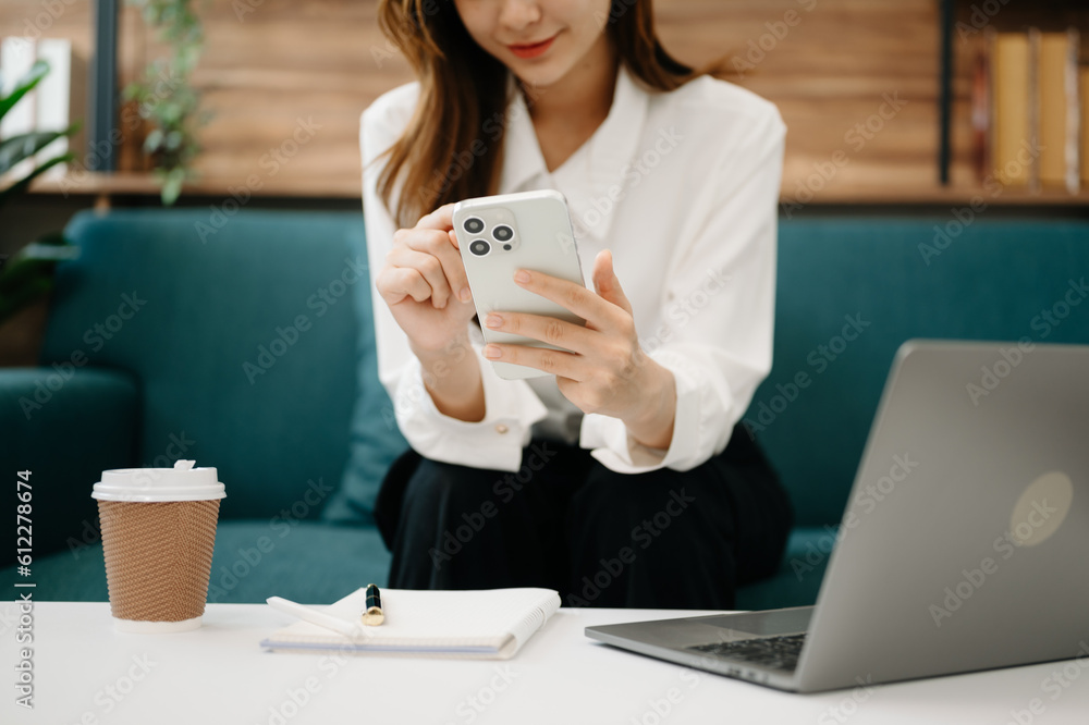 Businesswoman using on smartphone and tablet at home as concept. Businesswoman using on smartphone and tablet at home as concept.