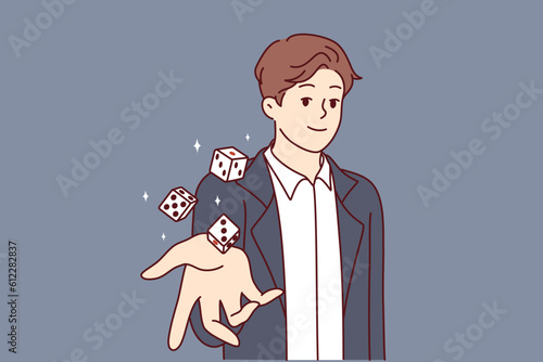 Man throws dice inviting you to visit casino and try your luck at roulette with big cash prize. Lucky guy with smile looks at screen demonstrates dice for gambling in las vegas casino