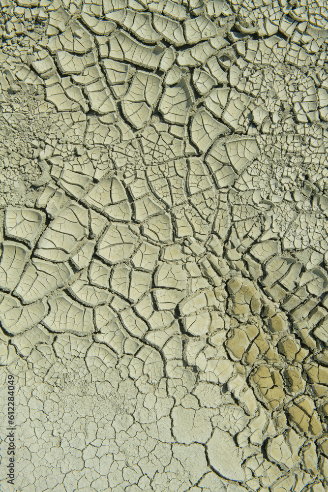 Fototapeta premium Clay and sand texture of dried soil, close-up. Dried soil texture on Nallıhan Kız hill. Nallihan Ankara, Türkiye.