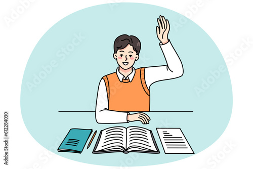 Active schoolboy sitting at desk in class raise hand volunteer to answer. Smart boy child participate in discussion at lesson. Clever kid at class. Education concept. Vector illustration.