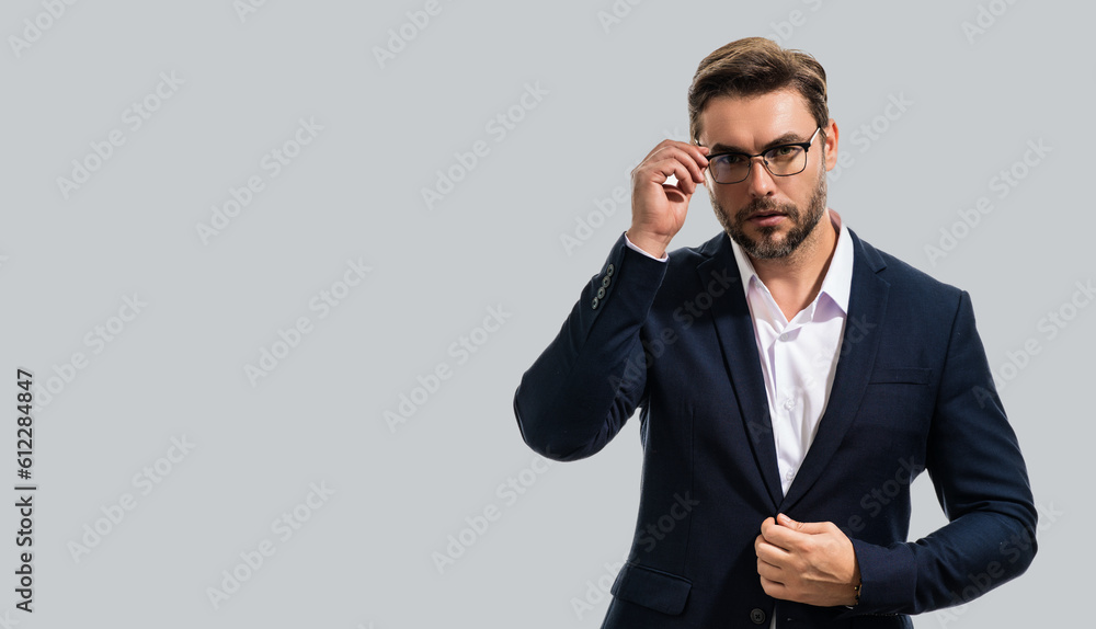 Business man on gray isolated banner background. Studio portrait of confident middle aged hiapanic businessman. Business man on gray isolated banner background. Studio portrait of confident middle aged hiapanic businessman.
