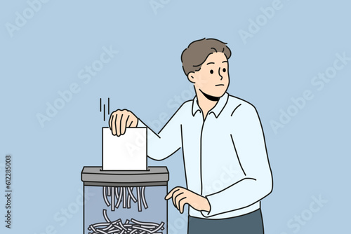 Businessman put paperwork in shredder in office. Scared male employee shredding document at workplace. Vector illustration. 