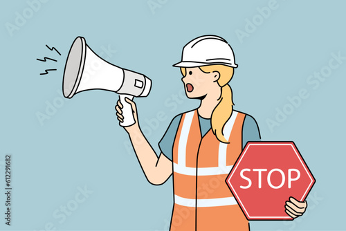 Female architect in helmet hold megaphone and stop sign regulate traffic on road. Woman builder screaming on construction site. Vector illustration. 