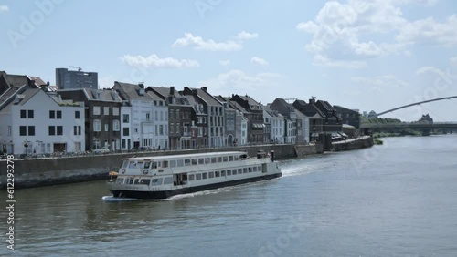 Beautiful view of the Maas (Meuse) river seen from the Sint Servaasbrug (St. Servatius Bridge) in Maastricht, Netherlands.